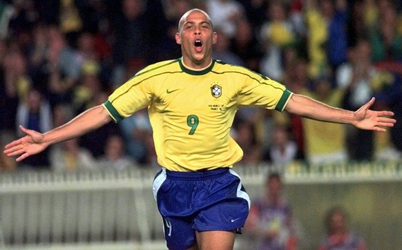 Brazil's Ronaldo celebrates after scoring hids sides 4th goal during the soccer World Cup 98 second round match between Brazil and Chile at the Parc des Princes in Paris Saturday June 27, 1998. ( ...