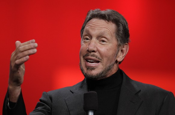 FILE - In this Oct. 2, 2012 file photo, Oracle CEO Larry Ellison gestures while giving a keynote address at Oracle OpenWorld in San Francisco. Oracle says Ellison is stepping aside as CEO of the compa ...