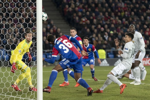 Basel&#039;s Manuel Akanji, center, knocks the ball over the goal during the UEFA Champions League Group stage Group A matchday 5 soccer match between Switzerland&#039;s FC Basel 1893 and England&#039 ...