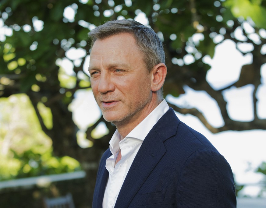 FILE - In this April 25, 2019, file photo, actor Daniel Craig poses for photographers during the photo call of the latest installment of the James Bond film franchise, currently known as &quot;Bond 25 ...