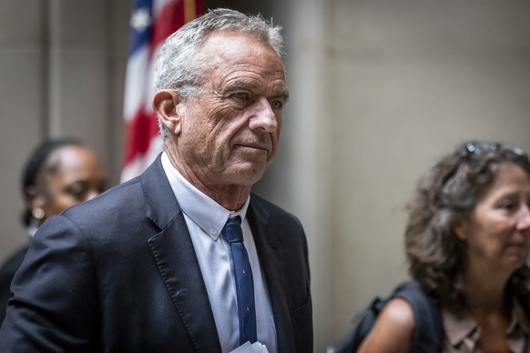 Independent Presidential candidate Robert F. Kennedy Jr. walks outside the courtroom at the Nassau County Supreme Court in Mineola, N.Y. on Wednesday, Aug., 21, 2024. (AP Photo/Stefan Jeremiah)