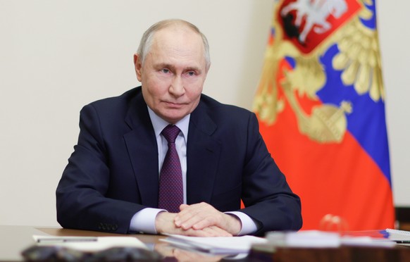 epa11892673 Russian President Vladimir Putin holds a meeting via video conference with Governor of Bryansk region Alexander Bogomaz (not pictured) at the Novo-Ogaryovo state residence outside Moscow,  ...