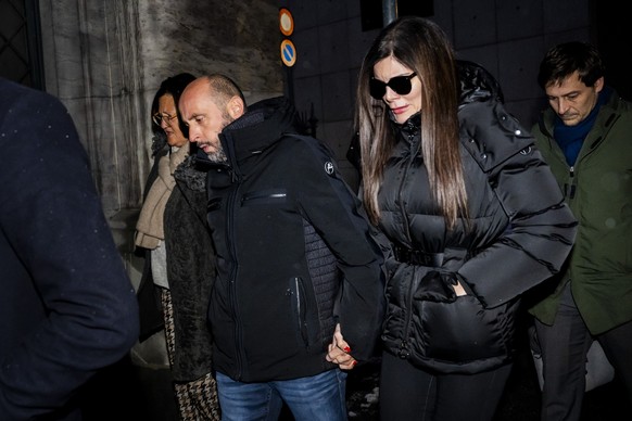 The owners of the bar in Crans-Montana, where the deadly fire happened on New Year's Day, Jacques and Jessica Moretti from France, center, arrive with their lawyers Yael Hayat and Patrick Michod, ...