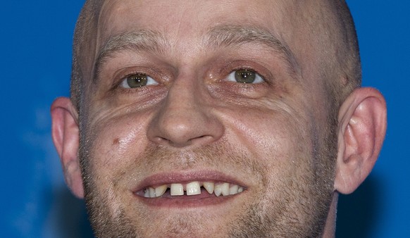 Actor Juergen Vogel poses for the photo call of the film Mercy (Gnade) at the 62 edition of the Berlinale, International Film Festival in Berlin, Thursday, Feb. 16, 2012. (AP Photo/Markus Schreiber)