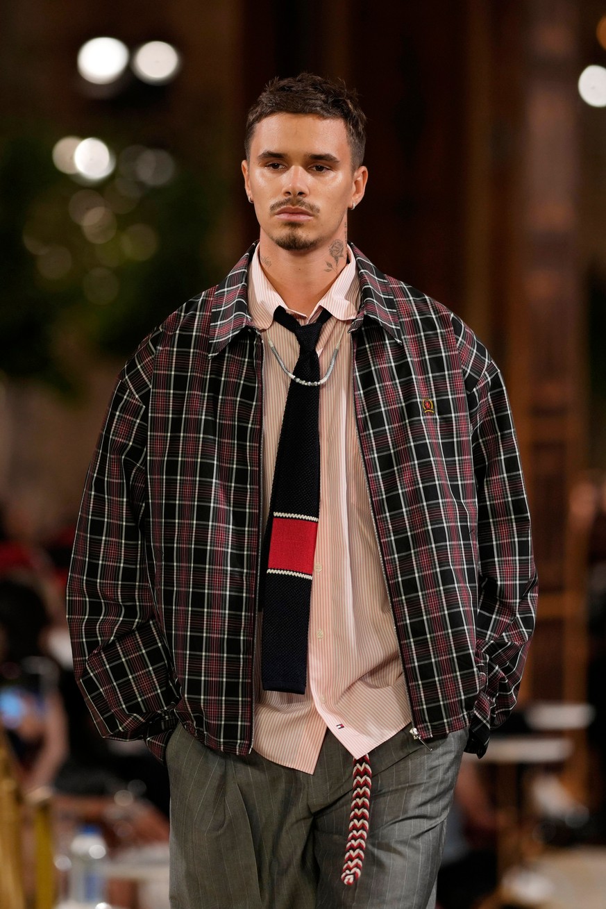 Romeo Beckham walks the runway during the Tommy Hilfiger/Summer 2027 presentation as part of New York Fashion Week on Thursday, Sept. 10, 2026, in New York. (Photo by Charles Sykes/Invision/AP)
Romeo  ...