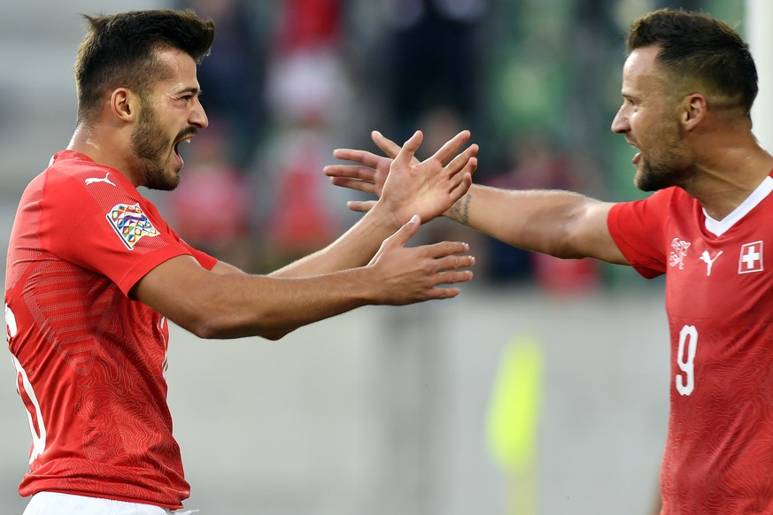 Switzerland&#039;s Albian AJeti, left, and Switzerland&#039;s Haris Seferovic, right, celebrates after the fift goal during the UEFA Nations League group stage match between Switzerland and Iceland in ...