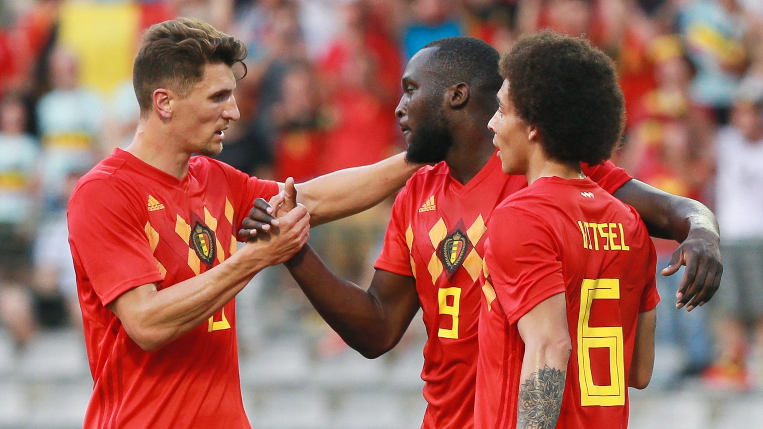 epa06789606 Thomas Meunier of Belgium, Romelu Lukaku of Belgium and Axel Witsel of Belgium react after Romelu Lukaku of Belgium scores 1-0 during a friendly soccer match between Belgium and Egypt at t ...