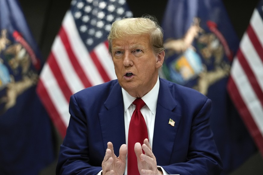 FILE - Republican presidential candidate former President Donald Trump speaks at a campaign event in Grand Rapids, Mich., Tuesday, April 2, 2024. Trump filed a law suit on March 24, suing two co-found ...