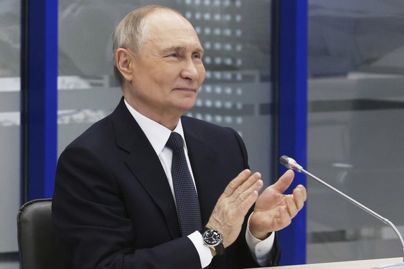 Russian President Vladimir Putin attends the initial loading ceremony at Lavna coal transshipment complex via videoconference in Murmansk, Russia, Thursday, March 27, 2025. (Sergei Karpukhin, Sputnik, ...