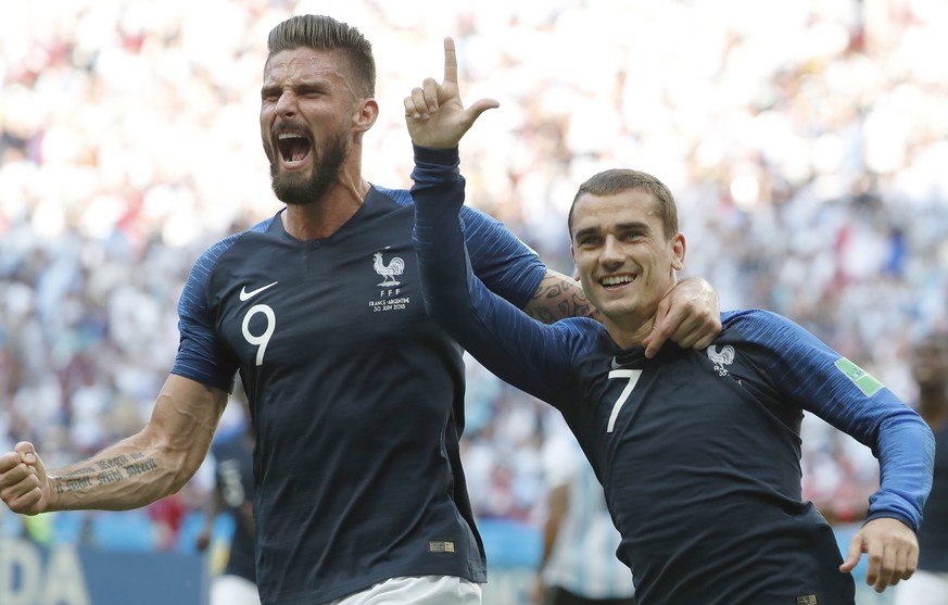 epaselect epa06851797 Antoine Griezmann of France celebrates with team mate Olivier Giroud (L) after scoring the 1-0 lead from the penalty spot during the FIFA World Cup 2018 round of 16 soccer match  ...