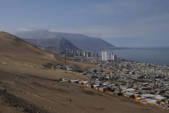 View of Dragon Hill, Iquique, Chile, Sunday, Dec. 12, 2021. Dragon Hill is an enormous sand dune about 4 km. long, located near the coast of Iquique. (AP Photo/Matias Delacroix)