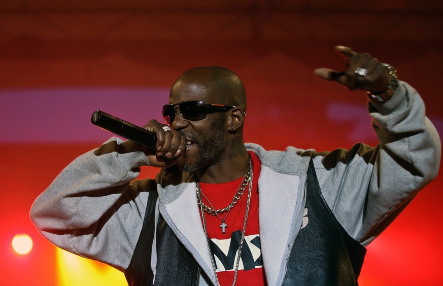 epa09114255 (FILE) - US rapper and actor DMX (Earl Simmons) performs on stage during his concert at Warsaw Challenge 2014 in Sowinski Park, Warsaw, Poland, 11 May 2014 (reissued 03 April 2021). Accord ...