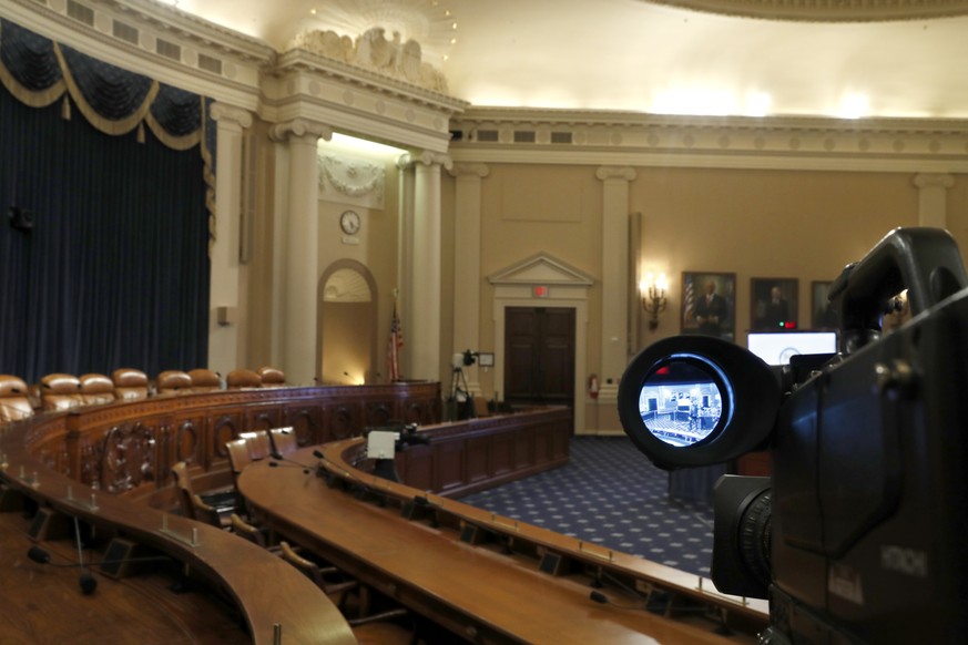 A television camera shows the hearing room where the House will begin public impeachment inquiry hearings Wednesday, during camera preparations on Tuesday, Nov. 12, 2019, on Capitol Hill in Washington ...