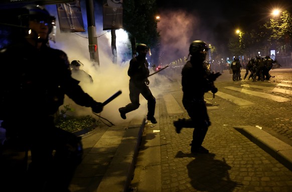 epa12148414 French police in action as fans of PSG celebrate after their team won the UEFA Champions League final between Paris Saint-Germain and Internazionale Milano, Paris, France, 31 May 2025. EPA ...