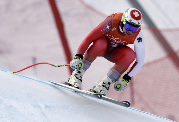 Switzerland&#039;s Beat Feuz competes in men&#039;s downhill training at the 2018 Winter Olympics in Jeongseon, South Korea, Saturday, Feb. 10, 2018. (AP Photo/Luca Bruno)