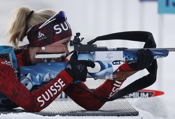 epa06527714 Elisa Gasparin of Switzerland at the shooting range during the Women&#039;s Biathlon 15 km Individual race at the Alpensia Biathlon Centre during the PyeongChang 2018 Olympic Games, South  ...