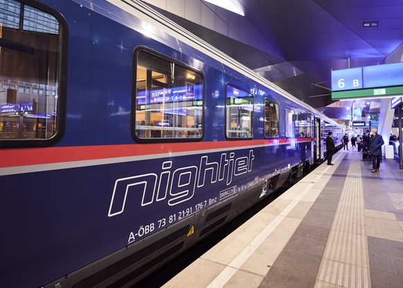 This image released by �BB shows a Nightjet sleeper train at a station in Vienna, Austria. A growing number of climate-conscious Europeans are giving up flying in favor of long-haul trains. (Marek Kno ...
