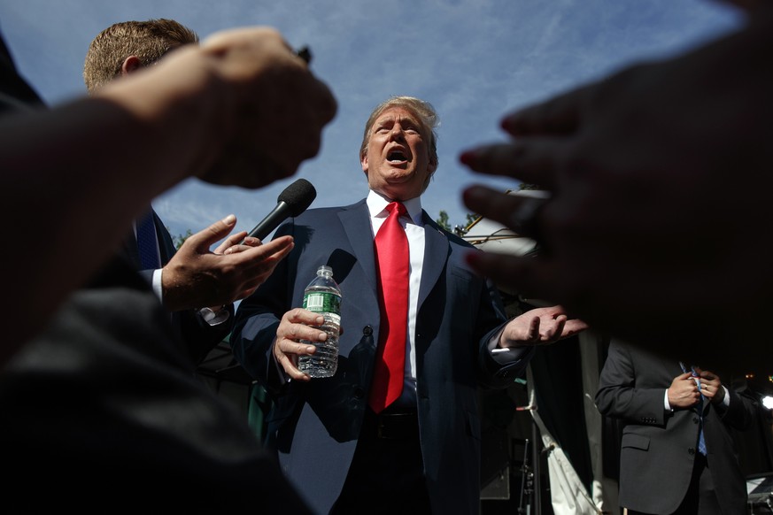 President Donald Trump speaks to reporters at the White House, Friday, June 15, 2018, in Washington. (AP Photo/Evan Vucci)