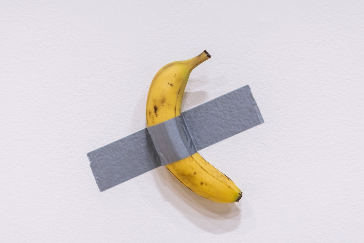 FILE - Artist Maurizio Cattelan's piece of art "Comedian" hangs on display during an auction preview at Sotheby's in New York, Monday, Nov. 11, 2024. (AP Photo/Eduardo Munoz Alvare ...