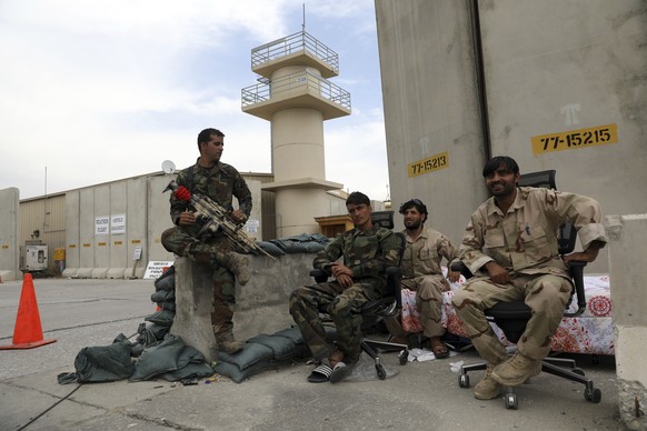 Afghan security forces keep watch after the American military left Bagram air base, in Parwan province north of Kabul, Afghanistan, Monday, July 5, 2021. The U.S. left Afghanistan&#039;s Bagram Airfie ...