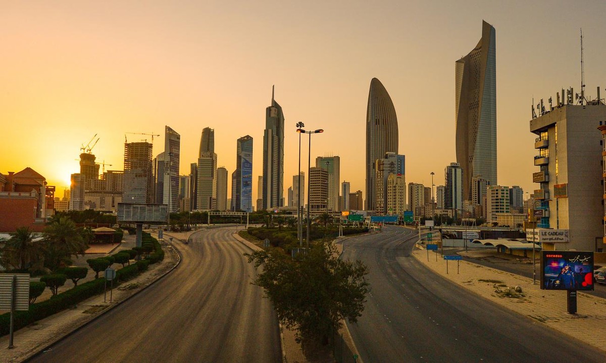 epa08330700 A view of empty streets, in Kuwait City, Kuwait, 29 March 2020. Kuwait imposed a nationwide curfew due to the ongoing pandemic of the Covid-19 disease caused by the SARS-CoV-2 coronavirus. ...