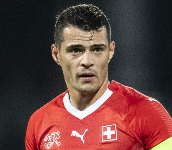 Switzerland&#039;s Granit Xhaka reacts during an international friendly soccer match between Switzerland and Qatar at the Cornaredo stadium in Lugano, Switzerland, on Wednesday, November 14, 2018. (KE ...