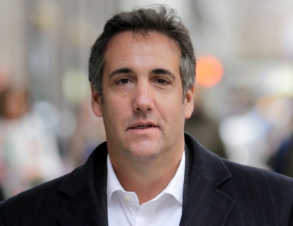 FILE - In this April 11, 2018, file photo, Michael Cohen, President Donald Trump&#039;s former attorney, walks along a sidewalk in New York. Cohen will testify publicly before Congress in February 201 ...