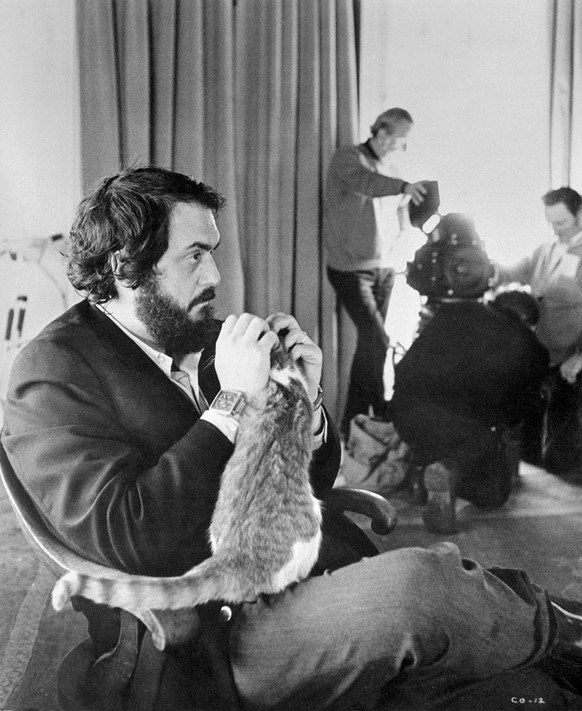 Movie still, from A Clockwork Orange, featuring Stanley Kubrick sitting in a chair playing with a cat. (Photo by �� John Springer Collection/CORBIS/Corbis via Getty Images)