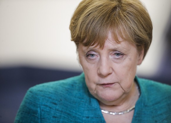 epa06849067 Germany&#039;s Chancellor Angela Merkel speaks at the end of a night of negotiation on migration during an European Council summit in Brussels, Belgium, 29 June 2018. EU countries&#039; le ...