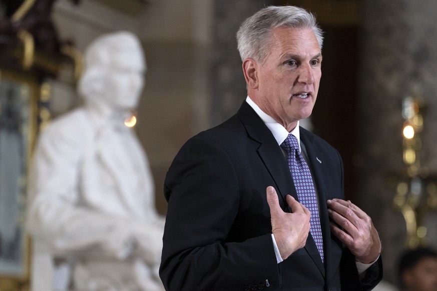 House Speaker Kevin McCarthy, of California, speaks about former House Speaker Paul Ryan, Wednesday, May 17, 2023, during a portrait unveiling of Ryan on Washington's Capitol Hill.  (AP Photo/Jacquelyn Ma...