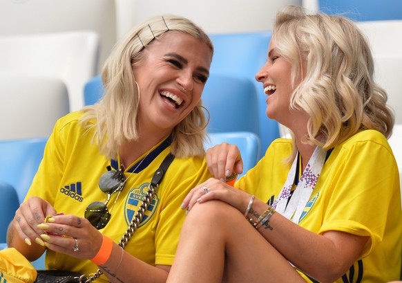 epa06870817 Josefin Johnsson (L), the wife of Sweden&#039;s Mikael Lustig and Tina Loonberg, the girlfriend of Sweden&#039;s Sebastian Larsson before the FIFA World Cup 2018 quarter final soccer match ...