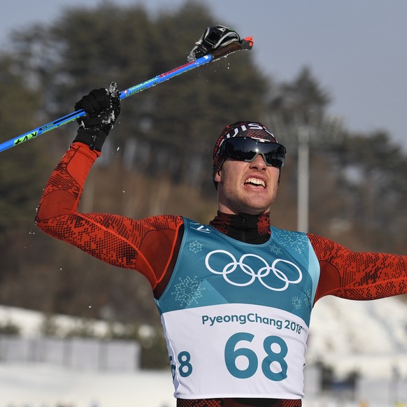 ARCHIVBILD ZUR MELDUNG, DASS DARIO COLOGNA ENDE SAISON AUFHOERT --- Dario Cologna of Switzerland reacts during the men Cross-Country Skiing 15 km free race in the Alpensia Biathlon Center during the X ...