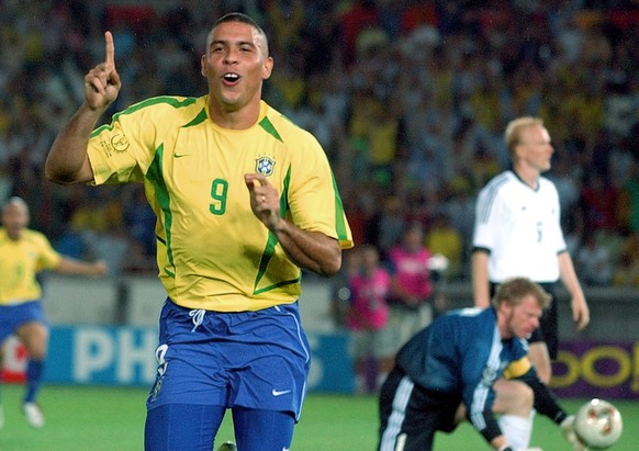 FILE - Brazil's Ronaldo celebrates scoring against Germany during the World Cup final soccer match at the Yokohama stadium in Yokohama, Japan on June 30, 2002. Brazil won the match 2-0 with Ronal ...