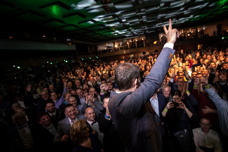 epa08261020 Leader of the Ordinary People and Independent Personalities (OLANO) party, Igor Matovic (C), celebrates with his supporters during an elections night at his election headquartes in Trnava, ...