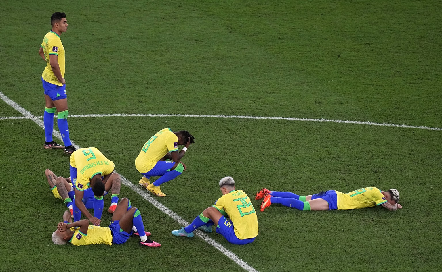 Brazil players react after the penalty shootout in the World Cup quarterfinal soccer match between Croatia and Brazil, at the Education City Stadium in Al Rayyan, Qatar, Friday, Dec. 9, 2022. (AP Phot ...