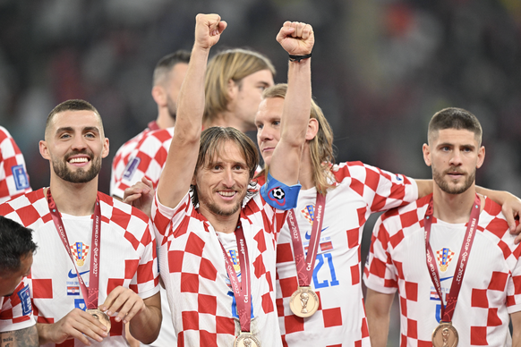 Croatia vs Morocco: 3rd Place - FIFA World Cup, WM, Weltmeisterschaft, Fussball Qatar 2022 DOHA, QATAR - DECEMBER 17: Luka Modric (10) of Croatia celebrates their victory at the end of the FIFA World  ...