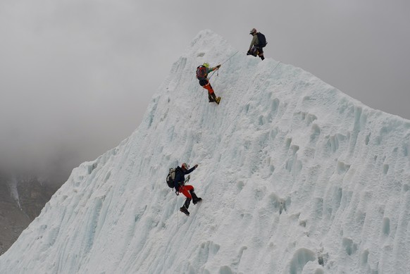 Mountaineers participate in a training session at the Khumbu Icefall as they prepare for their ascent to the summit of Mount Everest, Nepal, Saturday, May 2, 2026. (AP Photo/Pasang Rinzee Sherpa)
APTO ...