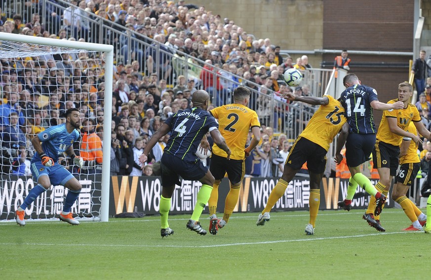 Manchester City&#039;s Aymeric Laporte, 2nd right, scores his side&#039;s first goal during the English Premier League soccer match between Wolverhampton Wanderers and Manchester City at the Molineux  ...