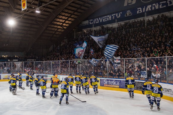 Ambri&#039;s players with cheer with the Curva Sud fans at the end of the third league qualification ice hockey game of the Swiss Championship 2016/17 between National League A team HC Ambri Piotta an ...