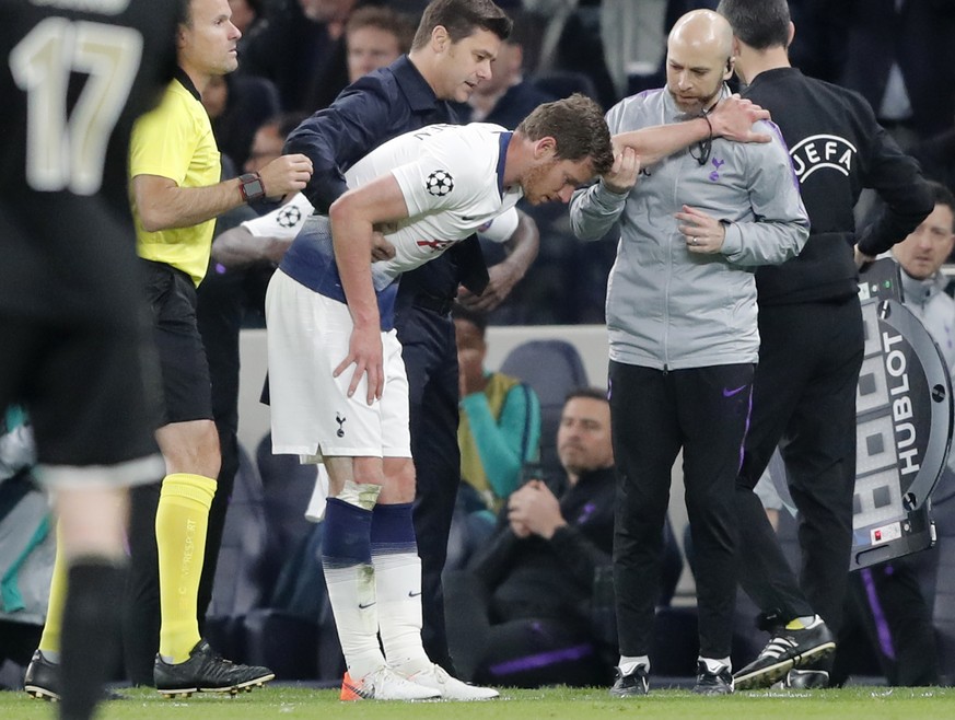 Tottenham&#039;s Jan Vertonghen walks off the pitch with a head injury during the Champions League semifinal first leg soccer match between Tottenham Hotspur and Ajax at the Tottenham Hotspur stadium  ...