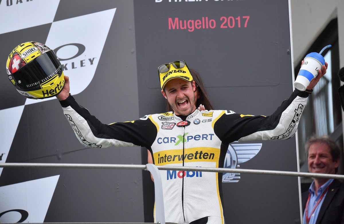 epa06009736 Second placed Swiss Thomas Luethi of Carxeper Interwetten celebrates on the podium of the Moto2 during the Italian Grand Prix at the Mugello circuit in Scarperia, Italy, 04 June 2017. EPA/ ...