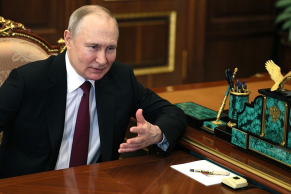 Russian President Vladimir Putin gestures while speaking to Yuri Borisov, the CEO of the Russian State Space Corporation &quot;Roscosmos&quot; during their meeting at the Kremlin in Moscow, Russia, We ...