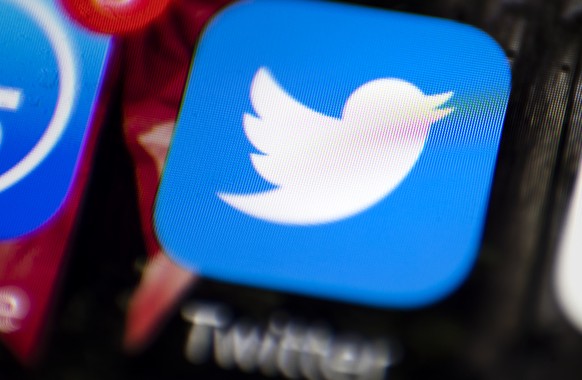 FILE - This April 26, 2017, file photo shows the Twitter app on a smartphone in Philadelphia. On Monday, March 1, 2021, Twitter said it has begun labeling tweets that include misleading information ab ...