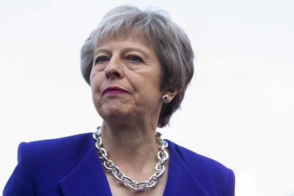 epa06737806 British Prime Minister Theresa May arrives for a photocall with members of the United Kingdom&#039;s Invictus Games team for the teams launch in Horse Guards Parade, Central London, 2018.  ...