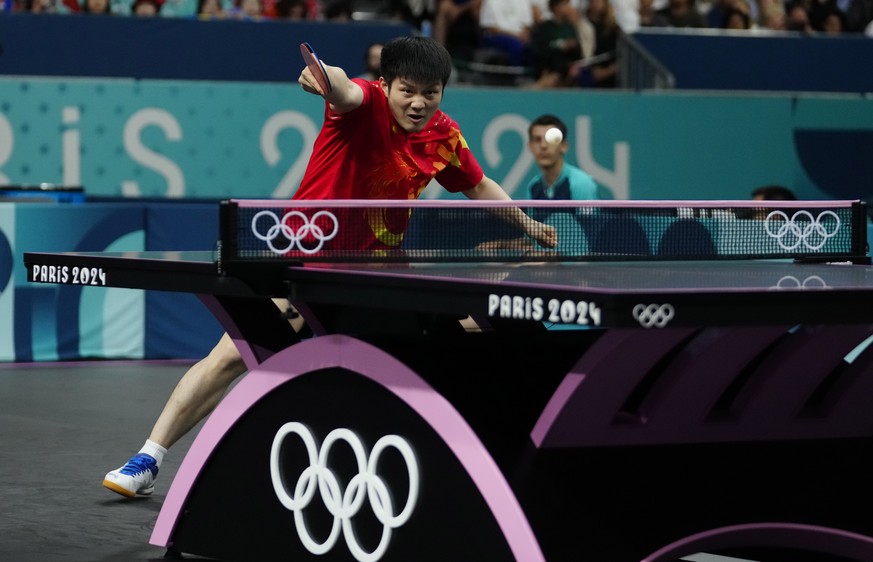 China&#039;s Fan Zhendong plays against South Korea&#039;s Lim Jonghoon during a men&#039;s teams quarterfinal table tennis match at the 2024 Summer Olympics, Wednesday, Aug. 7, 2024, in Paris, France ...