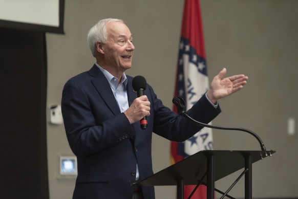FILE - In this July 15, 2021 file photo, Arkansas Gov. Asa Hutchinson speaks during a town hall meeting in Texarkana, Ark. Public health researchers on Tuesday, July 20, 2021, called the rapid rise in ...