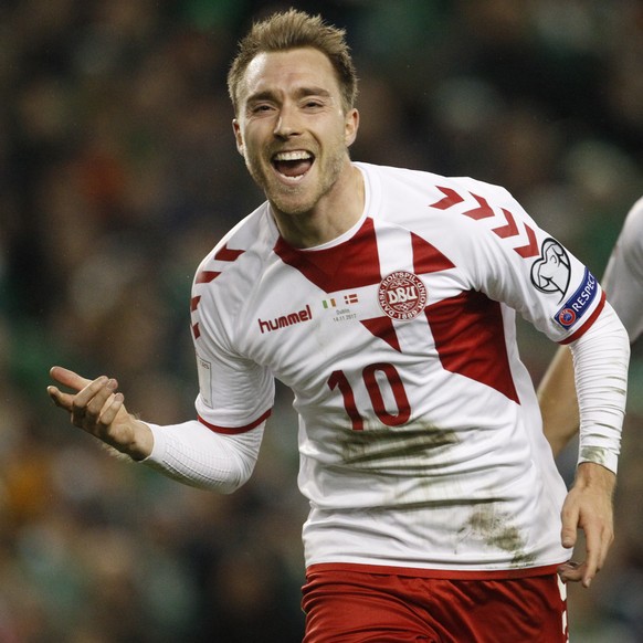 FILE - In this Nov. 14, 2017, file photo, Denmark&#039;s Christian Eriksen celebrates after scoring his side&#039;s third goal during the World Cup qualifying second leg soccer match against Ireland i ...