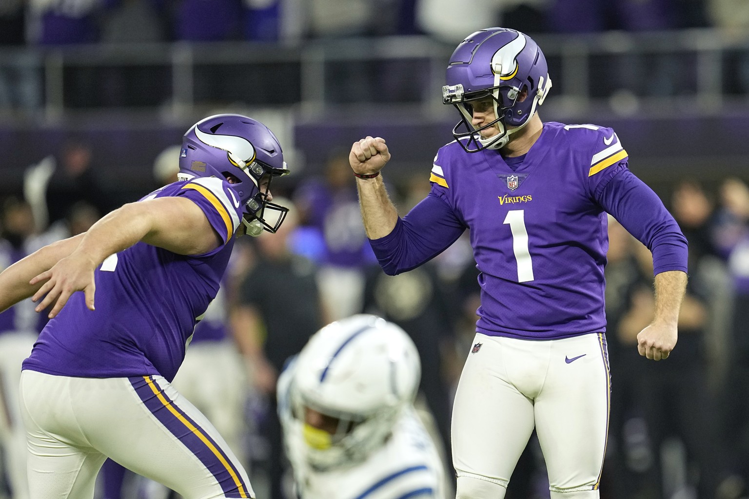Minnesota Vikings place kicker Greg Joseph (1) celebrates after kicking a 40-yard field goal during overtime in an NFL football game against the Indianapolis Colts, Saturday, Dec. 17, 2022, in Minneap ...