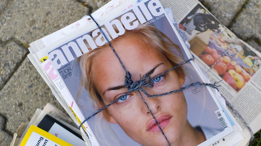 Bundles of scrap paper with an edition of the Swiss fashion magazine &quot;Annabelle&quot; on top featuring Swiss model Nadine Strittmatter on its cover, pictured on October 21, 2008 in Zurich, Switze ...