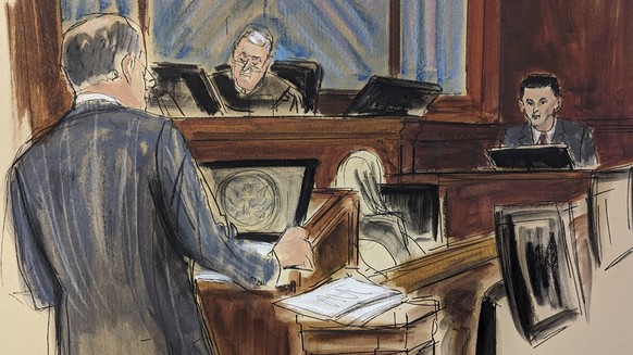 In this courtroom sketch, FTX founder Sam Bankman-Fried, right, is questioned by his attorney, Mark Cohen, left, as Judge Lewis Kaplan listens on the bench, center, during his trial in Manhattan feder ...